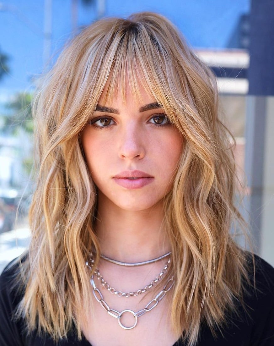 Blonde Collarbone Shag With Soft Blowout, Close-Up Take — Shag 2027 with Curtain Bangs