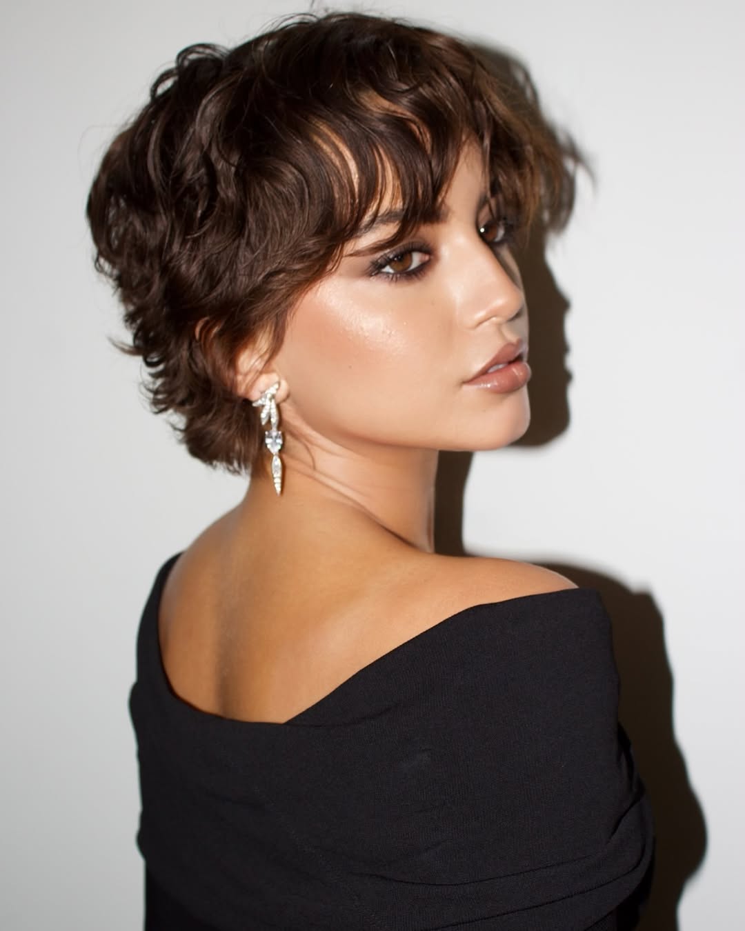 Textured Dark Brown Pixie With Wispy Bangs Textured Dark Brown Pixie With Wispy Bangs — Short Relaxed Hairstyles 2027